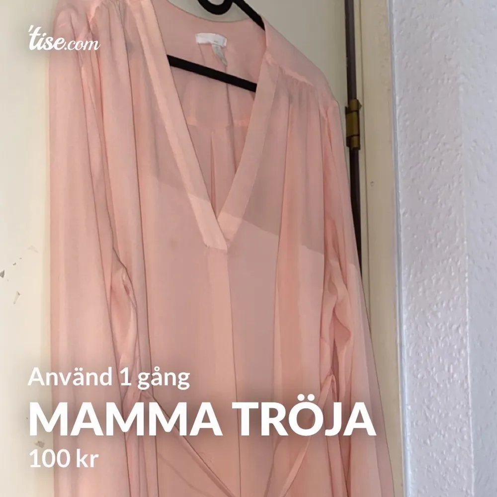 En rosa mamma tröja med knytsnöre i midjan. Använd 1 gång, är i nyskick. 100kr + 72krfrakt. Puserot.