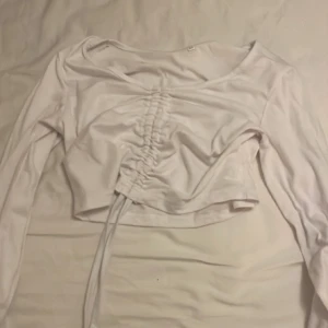 En långärmad magtröja - Kom priv