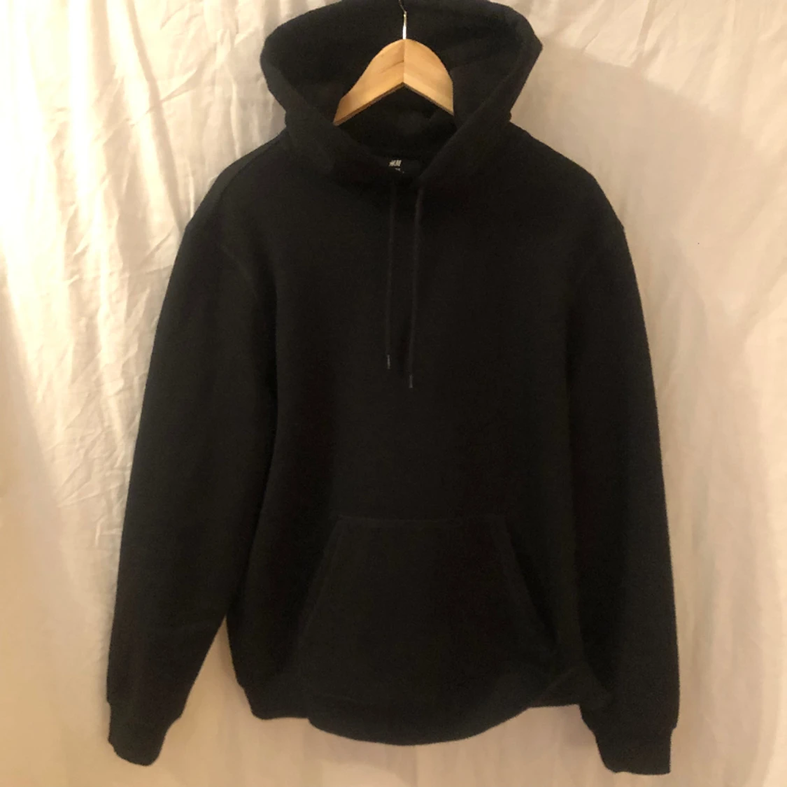 Svart hoodie från H&M