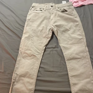 Grant jeans - Beige Grant Jeans, W 32, L 32  Modell 405