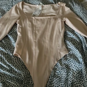 Rosa bodysuit  - Superfin rosa bodysuit Aldrig använt prislappen sitter kvar