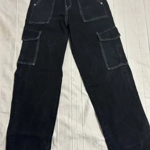 Black cargo pants - It comes in size S-M. Have been worn once. Price can be discussed!