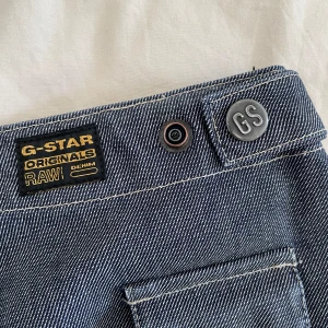 Vintage G-star originals Raw denim - Jeans/cargo in amazing conditions! Low rise  55% cotton 45% polyester   Unfortunately the tag is too old and does not show the size :(  I’m selling them because they are not my style anymore :(   Let me know if you are interested🫶🏻