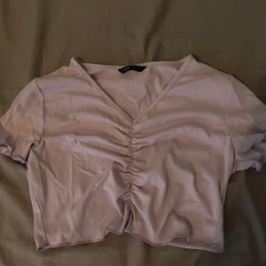 Kroppad t-shirt  - Hyfsat bra skick