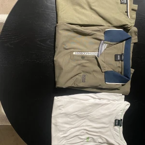 Hugo boss t shirts/pike - Pike= 300 ny skick storlek xl ,grön T-shirt=250 ny skick storlek L  ,vitt T-shirt =200 okej skick storlek L ,  packet pris 600kr hör av er vid funderingar o liknande såklart så är alla tre äkta