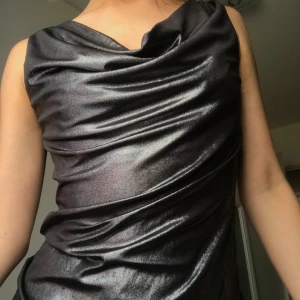 Metallic topp - Bra skick! Använder för lite