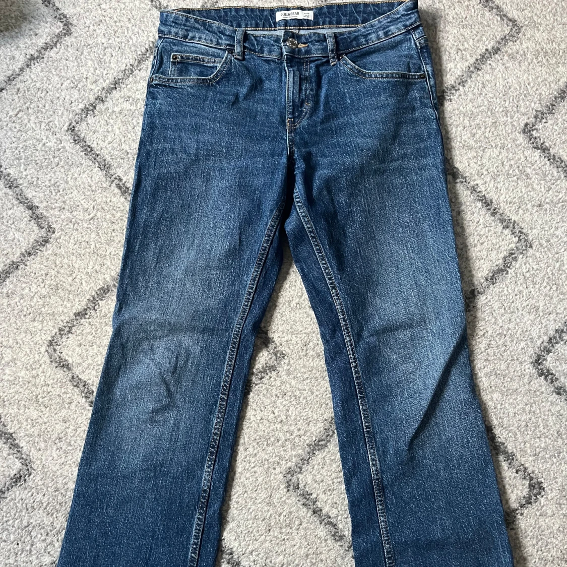 Bootcut mid-waist jeans 