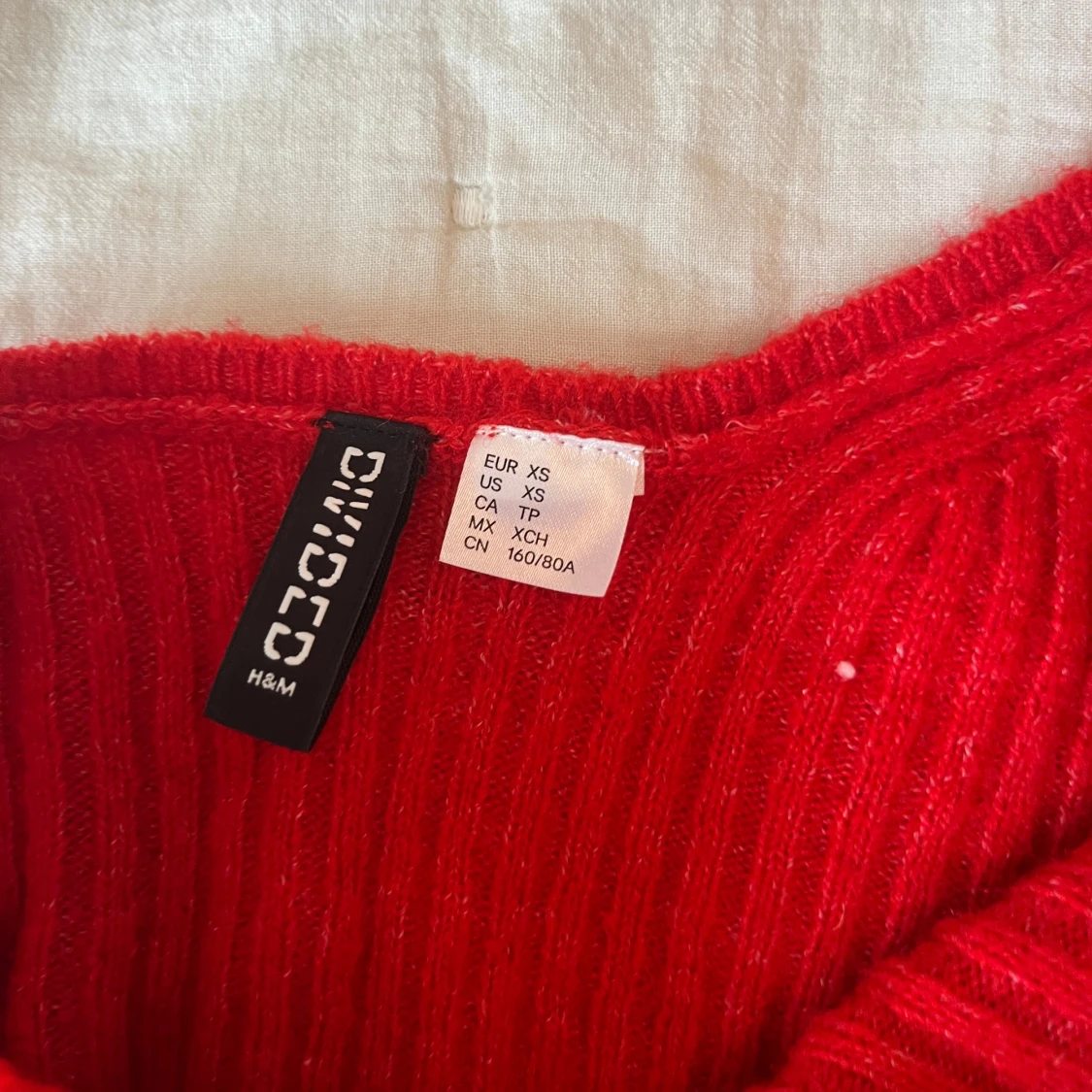 Asymmetrisk, stickad klänning - 91