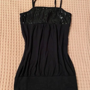 Black Glitter Top - Cute little top from second hand. Unworn and still completely new. Super soft and comfortable fabric.