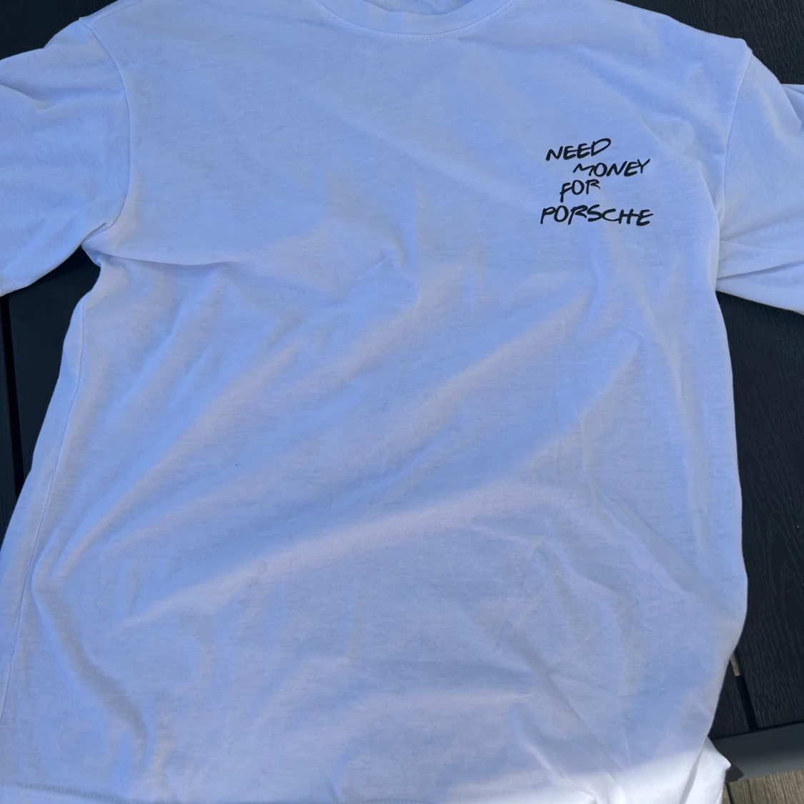 Need money for a Porsche t-shirt  - 90