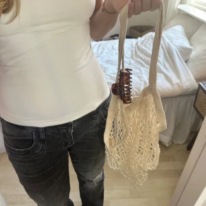 strandkasse av nät - nät strandkasse. väldigt rymlig och får plats med badlakan och mer! perfekt för stranden