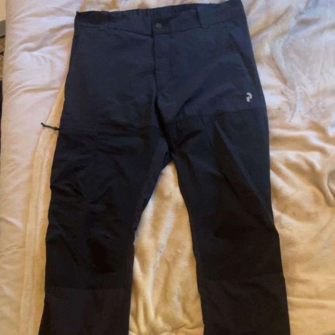 Säljer ett par Peak performance iconiq byxor storlek Large