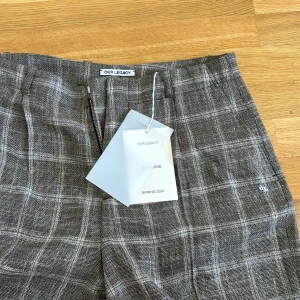 Our legacy linnebyxor  - Our legacy borrowed chino check wool linen, helt nya med tag! Nypris 2-3000, mitt pris 1750! Slutsålda överallt! Tag medföljer! Size 50 passar en 30-32