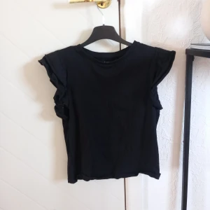 Söt svart topp - Storlek S
