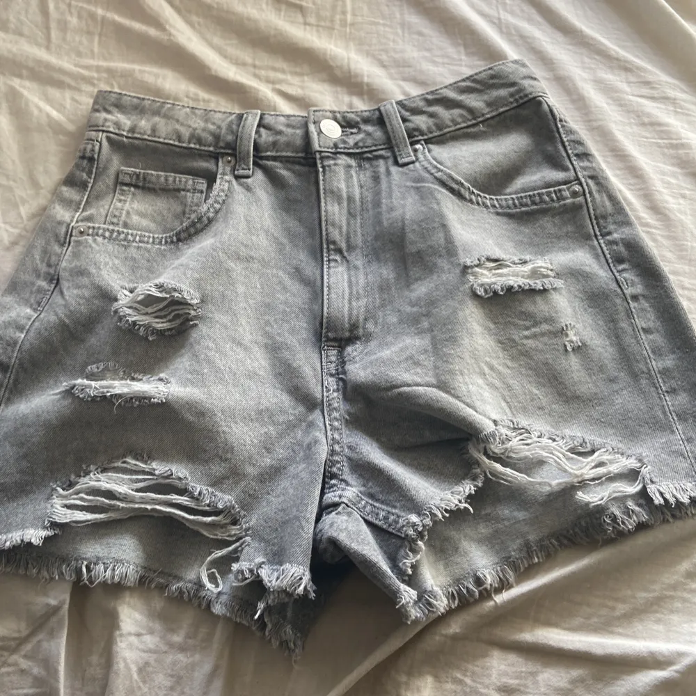 probably only used once, good to use for summer, long waist, nice and simple material.. Shorts.