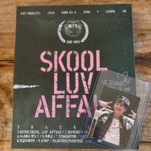 Helping my boyfriend sell his BTS Skool Love Affair album. The album comes with a matching photo card of Suga  in protective case.   Album is in mint condition. 