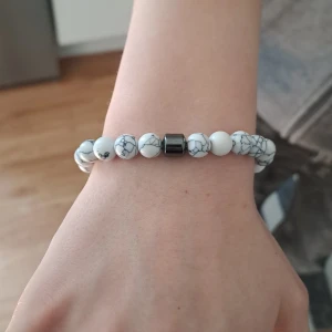 Armband  - Armband nytt i förpackning. 