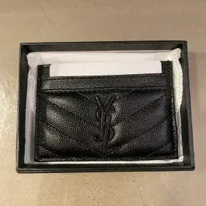 Yves Saint Laurent korthållare / plånbok. (Inget kvitto)