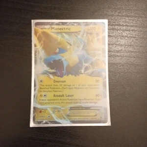 Manectric ex  - Jag säljer min Manectric ex pokemonkort. Den har lite repor.