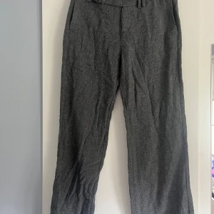 Gråa lågmidjade kostymbyxor - Lågmidjade vida kostymbyxor från zara