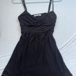 Cute short black dress spft material