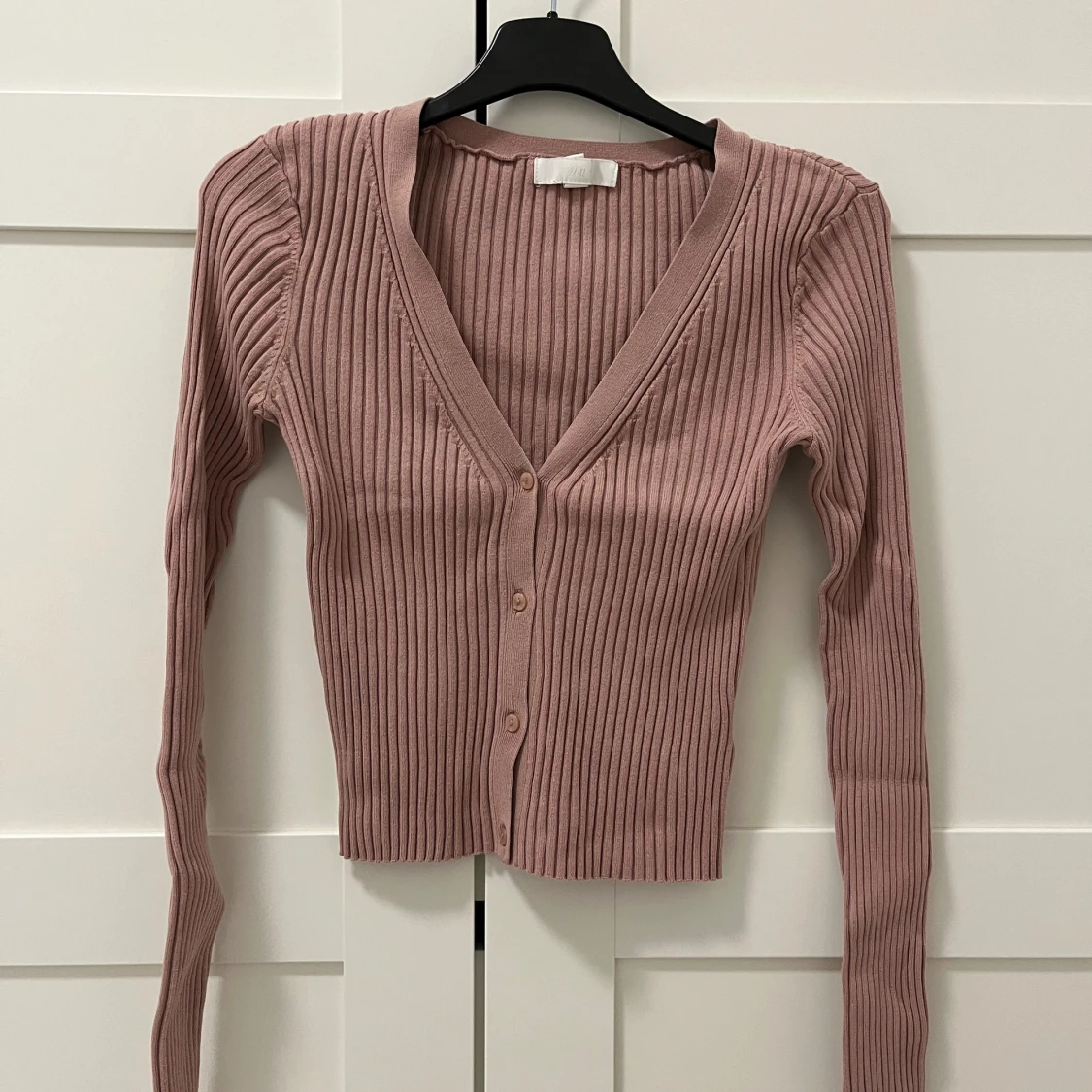 Puderrosa kofta/tröja