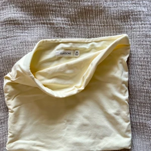 Tubtopp - Ljusgul Tubtopp från Glassons i Australien. Använd en gång