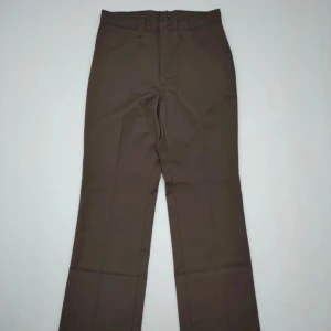 70s Setlowear byxor. (Dickies) - Fantastiska vintage kostym/workwearbyxor av dickies från 70-talet. De är tillverkade i usa och är i otrligt bra skick för sin ålder. Klassisk rak passform och snygga pressveck.