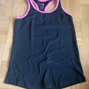 Linne  - Svart/rosa träningslinne