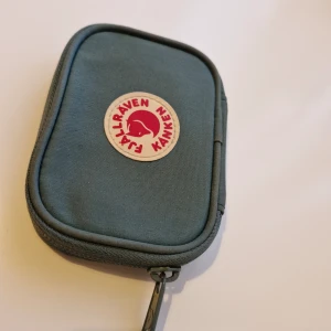 Fjällräven wallet - I bought it and just used it a couple of times, i dont see myself reaching out for it. Got it as a present. 