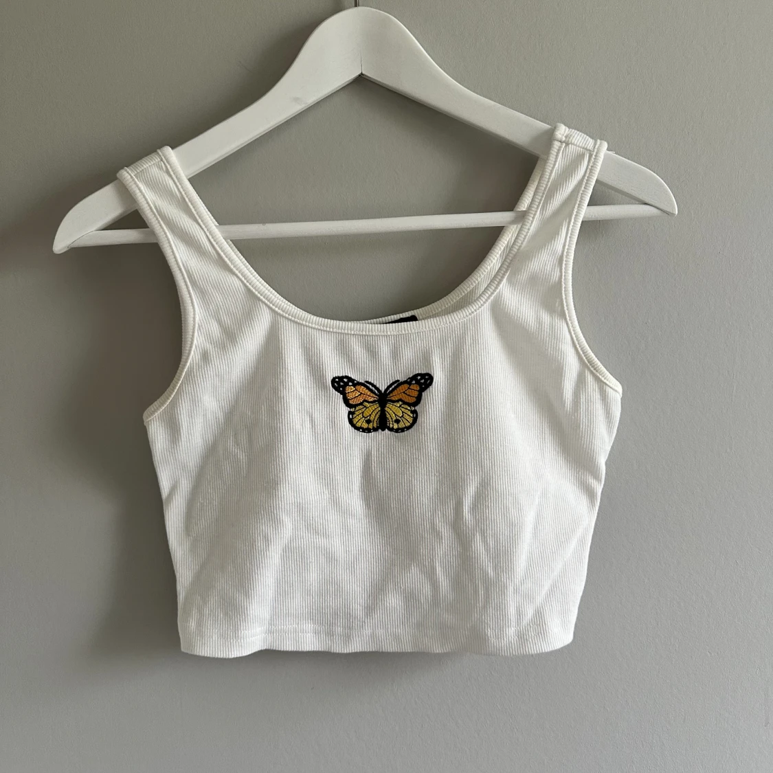 Topp med fjäril - 90