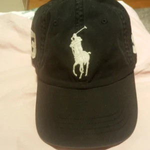 Raulph lauren keps - Svart keps passar alla