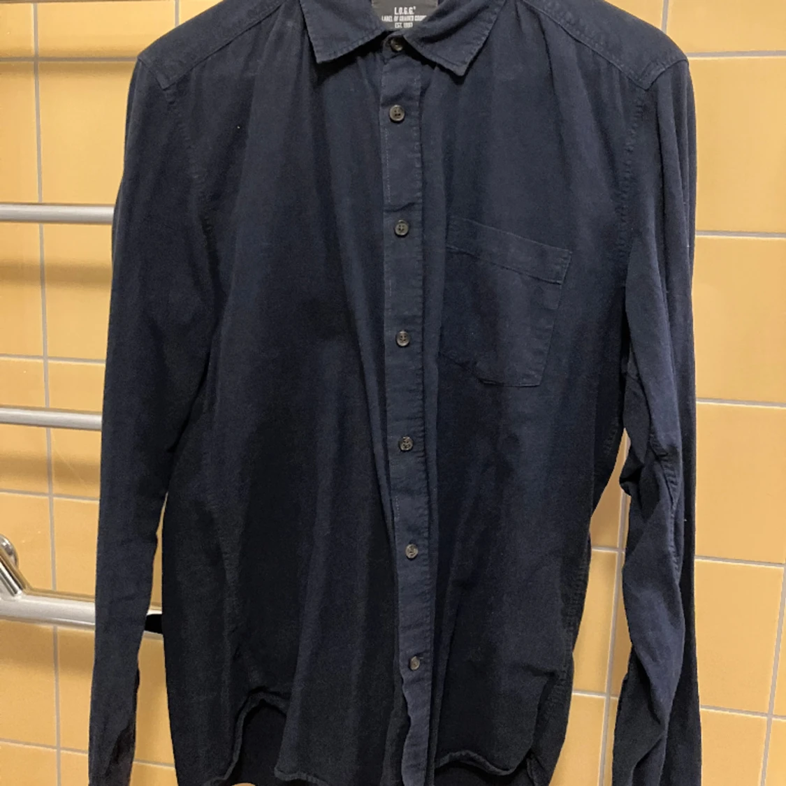 HM-Skjorta mörkblå Stl. M