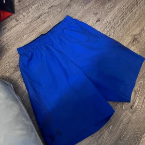 Badshorts. De rosa o gula från ralph lauren - Bra skick