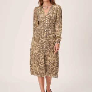 ADOORE PARIS DRESS BROWN ZEBRA STRL 36 - ADOORE PARIS DRESS BROWN ZEBRA STRL 36 Ny med alla lappar kvar! Nypris 1495kr, passa på!  Jag ansvarar ej för postens slarv! Skickar spårbart med postnord.