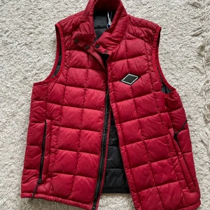 Reglat väst - En replay väst 