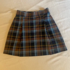 Rutig kjol - Snygg rutig kjol! Passar 36-38