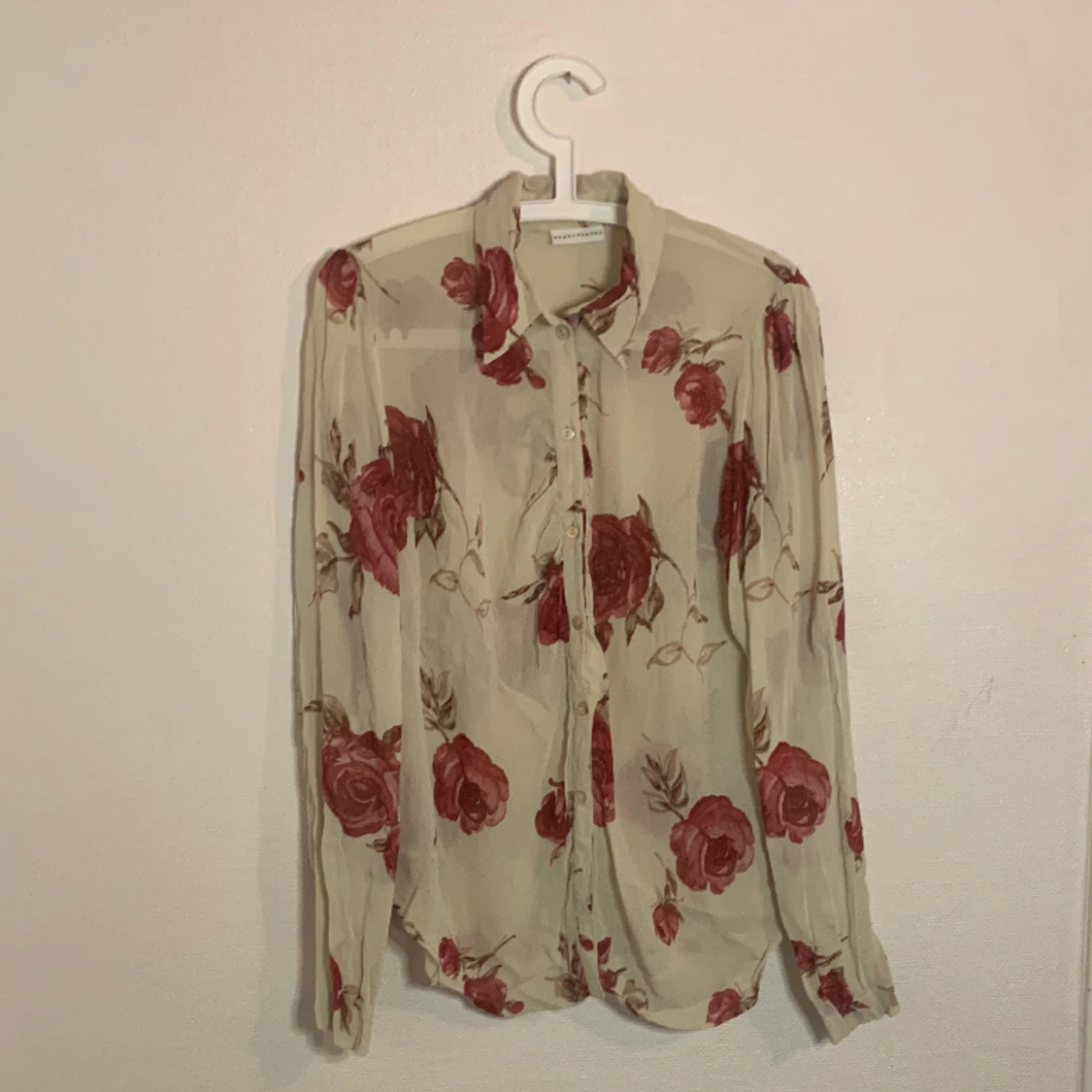 Blommig blus från nygårdsanna