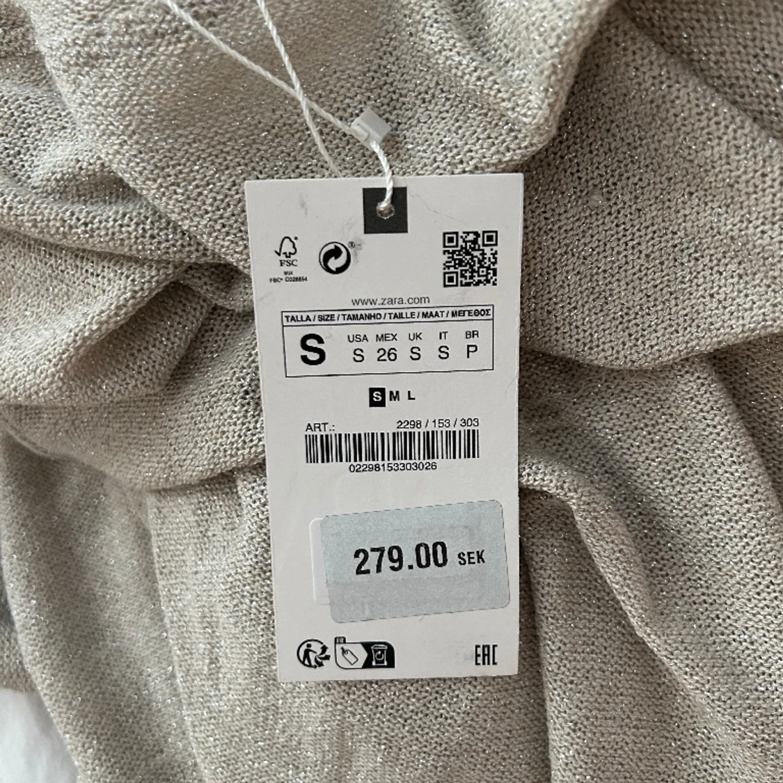 Stickad tröja med glitter - 91