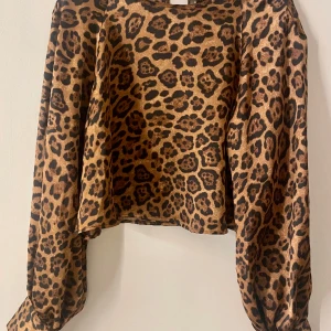 Leopard blus - Strl M 