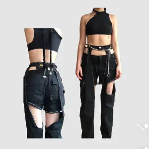 upcycled working pants made into pants consisting of shorts and chaps_ tooth does not come with_  size 34  _65% polyester 35 %cotton