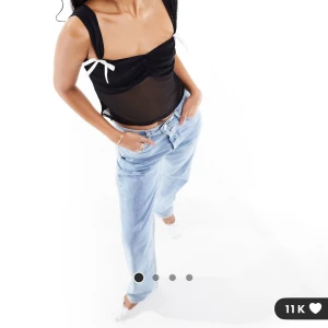 Meshtop med rosett - Helt ny, oanvänd topp i mesh, älskar den men den var för liten och glömt att lämna tillbaka. Storlek S 