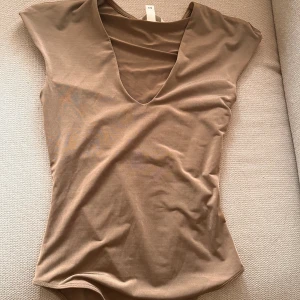 beige topp - nyskick 