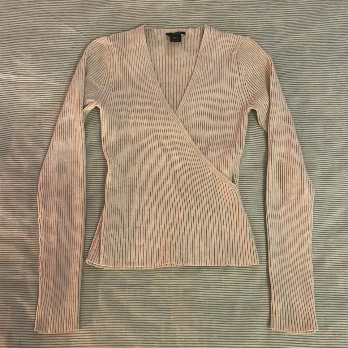 Stickad beige tröja