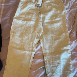 Line byxor - Helt nya byxor st L