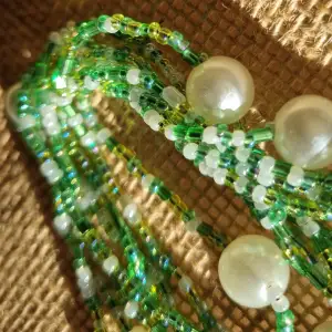 Green and white vintage,fashion accessory. Long strand of mix beads and pearls that can signify your uniqueness and express yourself in style.  Handmade/Handcrafted.  3way fashion accessory necklace,bracelet and anklet. 