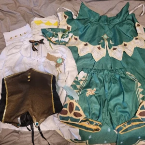 Genshin impact Venti cosplay - Får mardrömmar av den snälla köp 🙏 Är storlek M men ärmarna är lite korta på mig men inte något som stör. Inkluderar peruk. Bara använd en gång. 