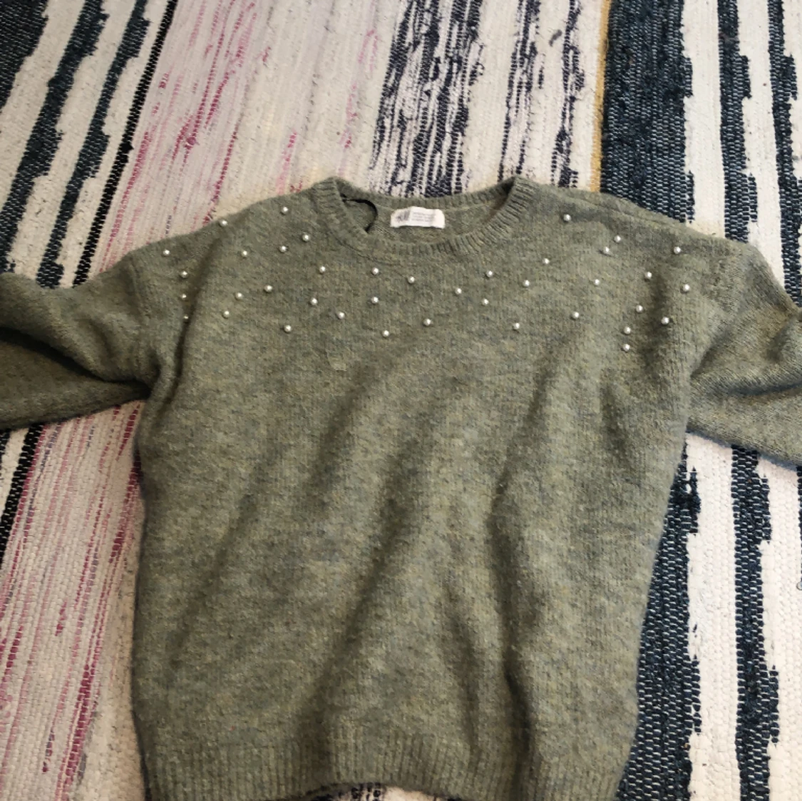 Fin långärmad stickad tröja