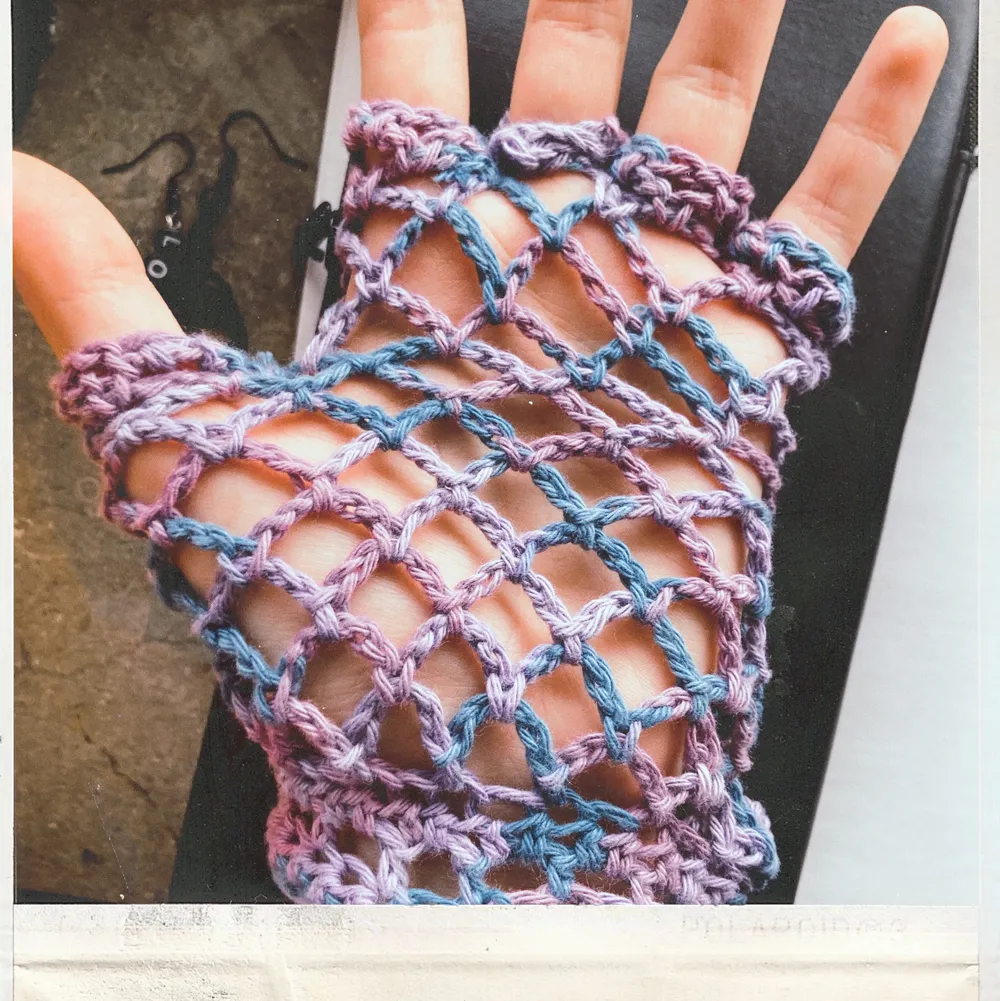 Crocheted fishnet fingerless gloves (colorful edition). Handmade. One size, one color, but can customize it to your needs.  Contact this ad if you want a custom order.  Can make anything!. Stickat.