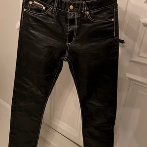 Eytys byxor - Svarta glansiga. Bra skick!